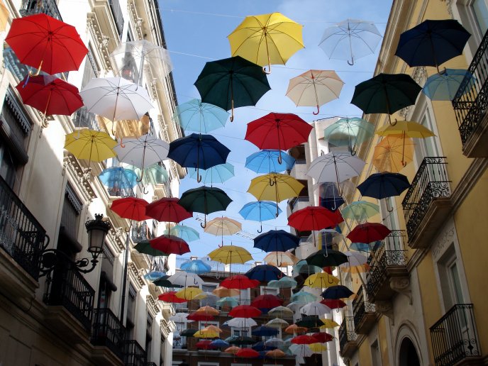 Umbrellas placed on a wire to dry