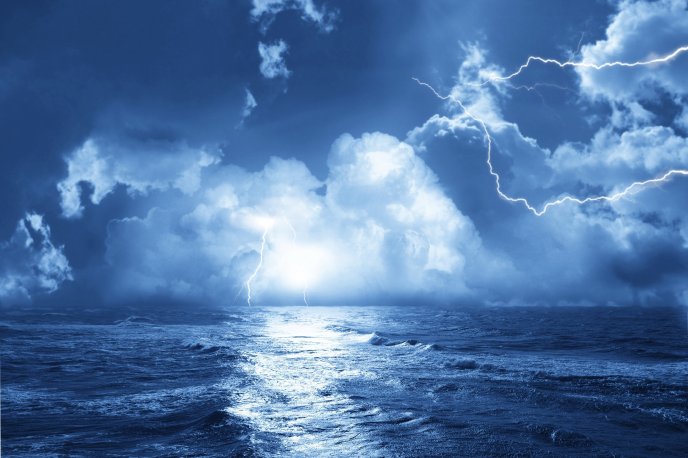 Storm at sea - lightnings on the sky blue