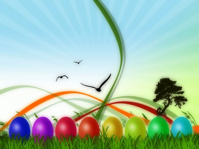 Colored eggs in the grass - beautiful Easter paint