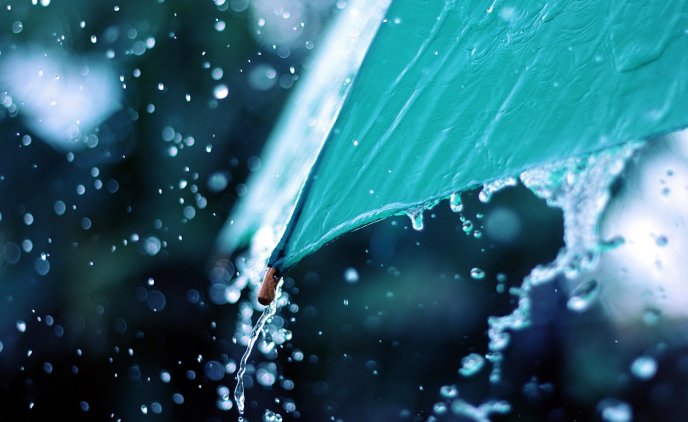 Rainy day - beautiful wallpaper umbrella in the water