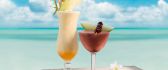 Fresh cocktails on the beach - summer holiday