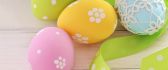 Flowers on the colored Easter eggs - Happy spring Holiday