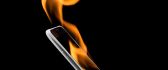 IPhone on fire - Black wallpaper and dark background