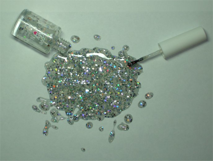 Silver nail polish filled with crystals