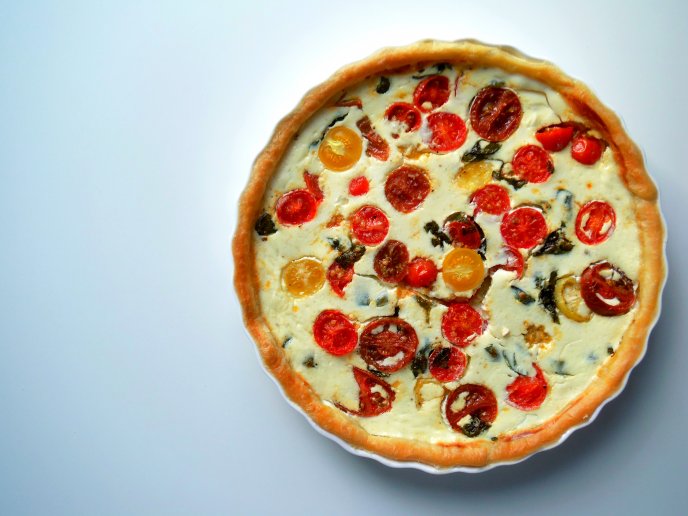 Delicious pie with ricotta and lots of tomatoes