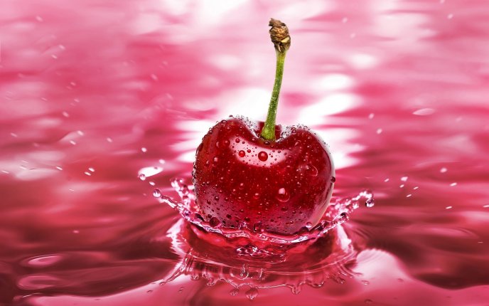 Fresh cherry thrown into the water - 3D Macro wallpaper