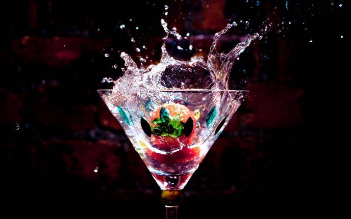 Professional photo - berries in a glass of drink