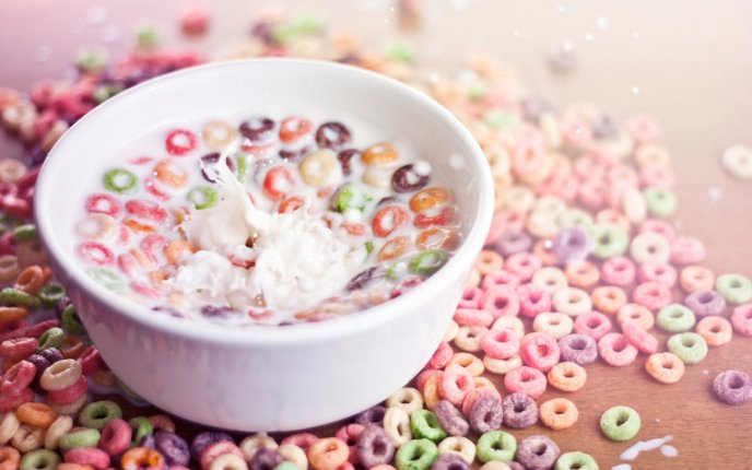 Delicious breakfast - milk and colored cereals