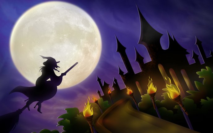 Witch on broom on Halloween night