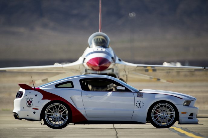 White car on an aircraft runway - beautiful Mustang 2014
