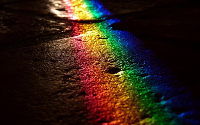 Rainbow on the road in the night