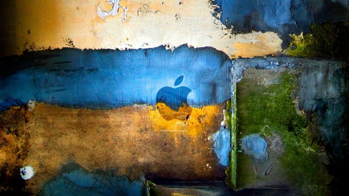 Abstract old wall with painted apple logo