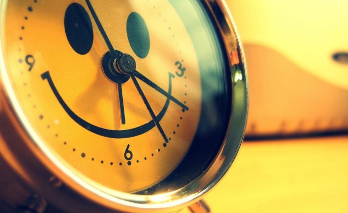 Happy smiley face on a clock - Good morning