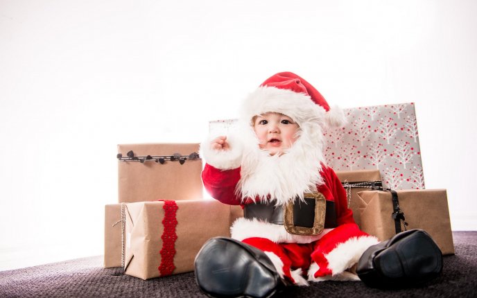 Wonderful baby Santa and the gifts - HD winter Holiday