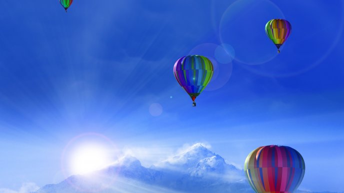 Colorful hot air balloons on the blue sky - Cold winter day