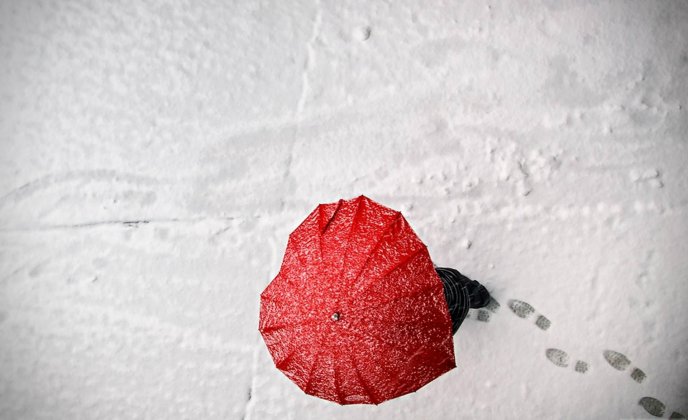 Red umbrella in shape of heart - Love winter