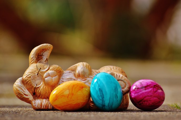 Funny bunny and Easter colorful eggs - Happy Holiday