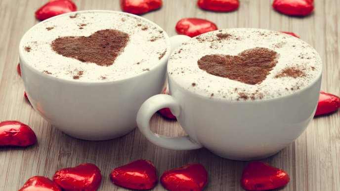 Cinnamon hearts in cups with hot chocolate drinks -Love time
