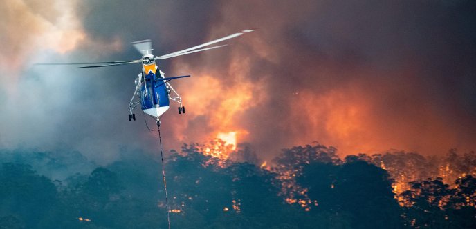 Helicopter rescue people and animals from Australia fire