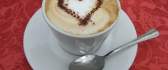 Cappuccino with latte art chocolate heart