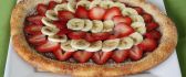 Delicious sweet pizza with nutella and fruits