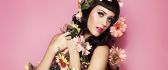 Katy Perry with many colorful flowers