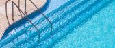 Blue and cold water in the pool - Summer holiday