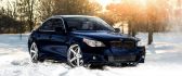 Blue BMW in the white snow - HD Winter wallpaper