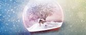 Winter season in a crystal globe - December month