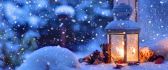 Warm winter season - Candle light in the snow