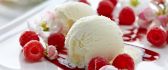 Raspberry fresh fruits and vanilla ice-cream - delicious